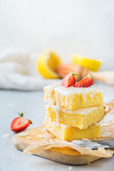 Homemade lemon polenta cookie bars with white icing