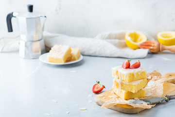 Homemade lemon polenta cookie bars with white icing