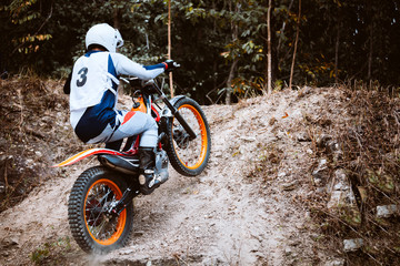 Fototapeta premium Trials motorcycle while competition in nature park