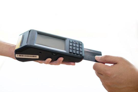 Woman placing credit card into reader