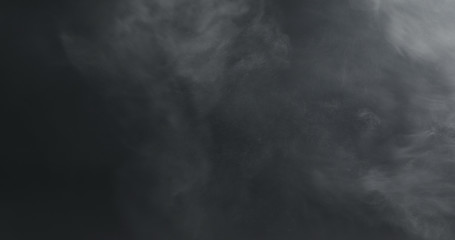 vapor steam over black background