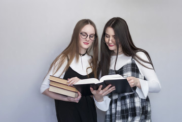 Two female students with books