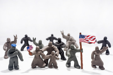 Patriot's Day celebration. Abstract photo. Figures made from Play Clay.