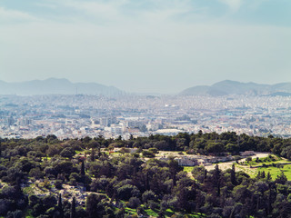 Fototapeta na wymiar Athens, Greece, 03.03.2018: View of Athens city with Lycabettus hill in the background. view of Athens city with Plaka neighborhood