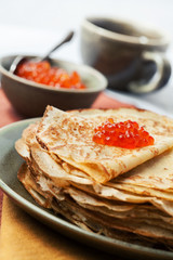 Sourdough pancakes with red salmon caviar