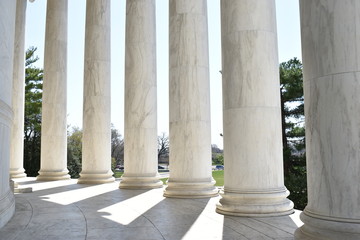 Closeup of white stone pillars at the Jefferson Monument on Lake Tidal Basin in Washington D.C in the USA