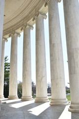 Fototapeta premium Closeup of white stone pillars at the Jefferson Monument on Lake Tidal Basin in Washington D.C in the USA