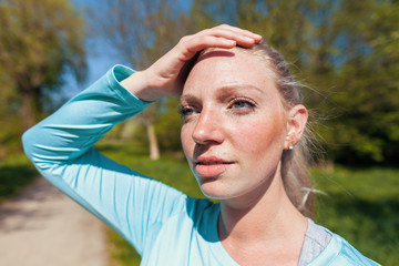 Young woman posing in a sport dress