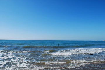 Sea waves in sunny day