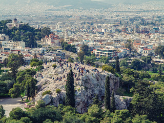 Fototapeta na wymiar Athens, Greece, 03.03.2018: View of Athens city with Lycabettus hill in the background. view of Athens city with Plaka neighborhood