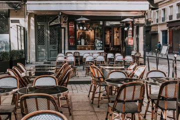 Fototapeten  Cafe with tables on street, Paris, France © Ekaterina Belova