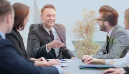 businessman at a meeting with employees