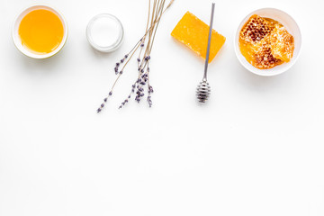 Aromatic theraphy and delicate skin care. Spa set based on honey on white background top view copy space