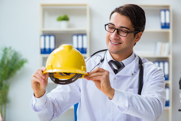 Safety doctor advising about wearing hard hat