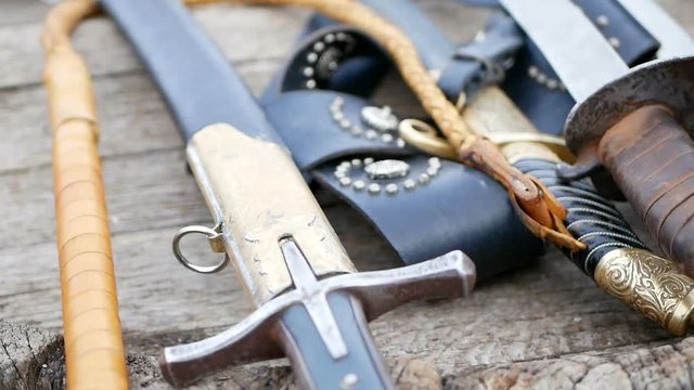 Cossack sword with knives and sword belt.