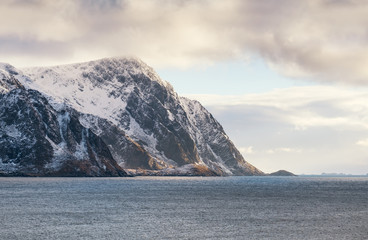 Fototapeta na wymiar Mountain ridge near the ocean. Beutiful natural panorama in the Norway
