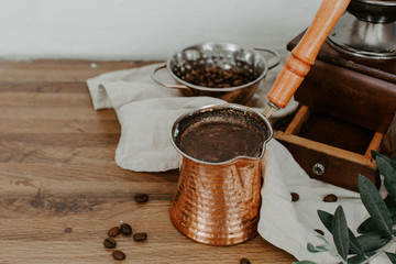 Turkish coffee pot on rustic trendy background