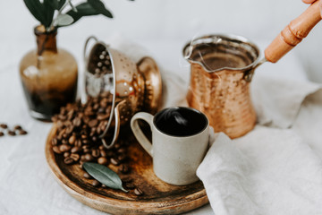 Arabic coffee pot with beens. Rural scene