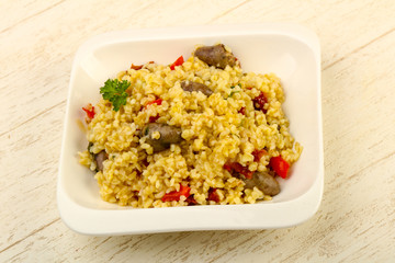 Bulgur with chicken hearts