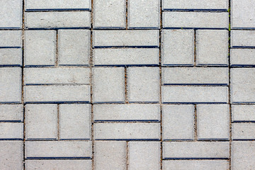 Texture of paving slabs. Arrangement of city streets and squares_