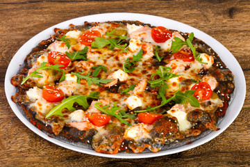 Pizza with salmon and mozzarella