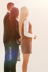 side view. business team looking ahead. photo in full growth