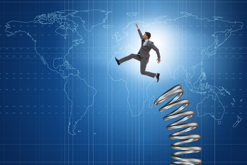 Fototapeta na wymiar Businessman jumping from spring in promotion concept