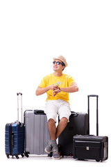 Fototapeta na wymiar Happy young man going on summer vacation isolated on white