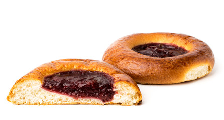 Bun with jam and half on a white background.