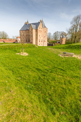 Fototapeta na wymiar Fortress Loevestein in Poederoijen, Zaltbommel, Gelderland, Netherlands. Most famous castle of the Netherlands.
