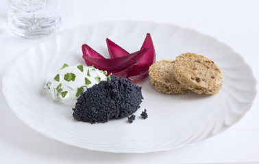Caviar with red wine onions and toast