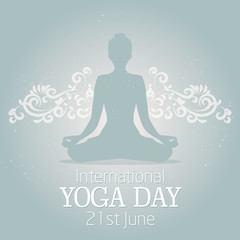 Fototapeta na wymiar International Yoga day illustration with a beautiful decor elements and lotus pose silhouette.