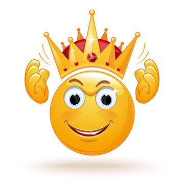King emoticon wears a crown. Smiley king. Positive smiling ball in the crown. King expression. King emoji. Cheerful monarch in the crown. Vector illustration