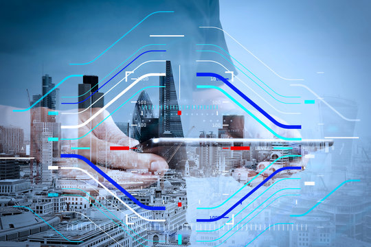 Double exposure of success businessman using digital tablet with london building and social media diagram