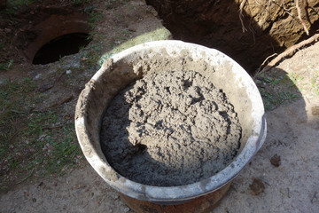 The prepared concrete mixture in the vessel