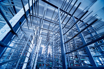 Fototapeta premium Factory for aluminum and PVC windows and doors production. Details industrial equipment.