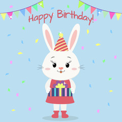 A cute white rabbit in clothes standing and holding a gift box in paws, flags, confetti. Happy Birthday. Cartoon style, apartment, vector.