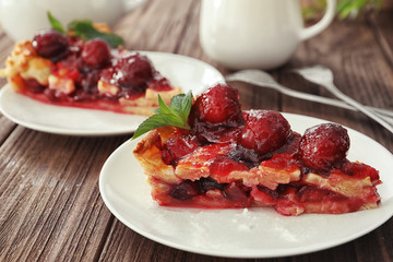 Delicious piece of cherry pie on plate