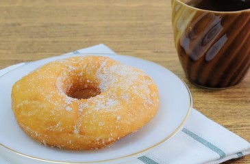 Glazed Donut with Sugar Served with Tea