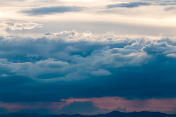 colorful dramatic sky with cloud at sunset.