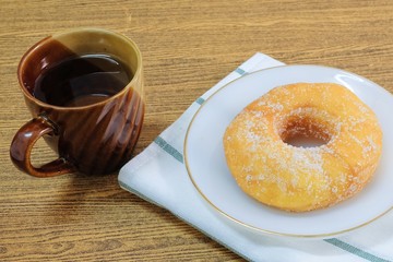 Glazed Donut with Sugar Served with Tea
