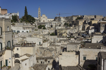 Obraz premium Day view of the historic Sassi district of Matera, with the Cathedral in the background