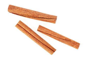Fragrant cinnamon sticks isolated on white background, top view