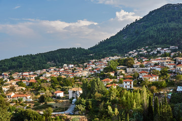 Fototapeta na wymiar small city on the mountainside on the island of Lefkada.