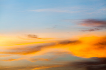 colorful dramatic sky with cloud at sunset.