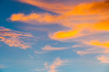 colorful dramatic sky with cloud at sunset.