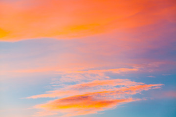 colorful dramatic sky with cloud at sunset.
