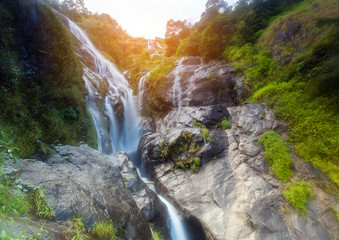 Obraz premium Waterfall hidden in the tropical jungle