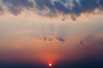 colorful dramatic sky with cloud at sunset.
