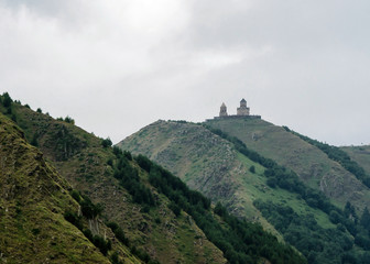 Fototapeta na wymiar The temple on the mountain top Georgia